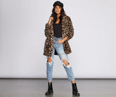 Veste en fausse fourrure à motif léopard féroce